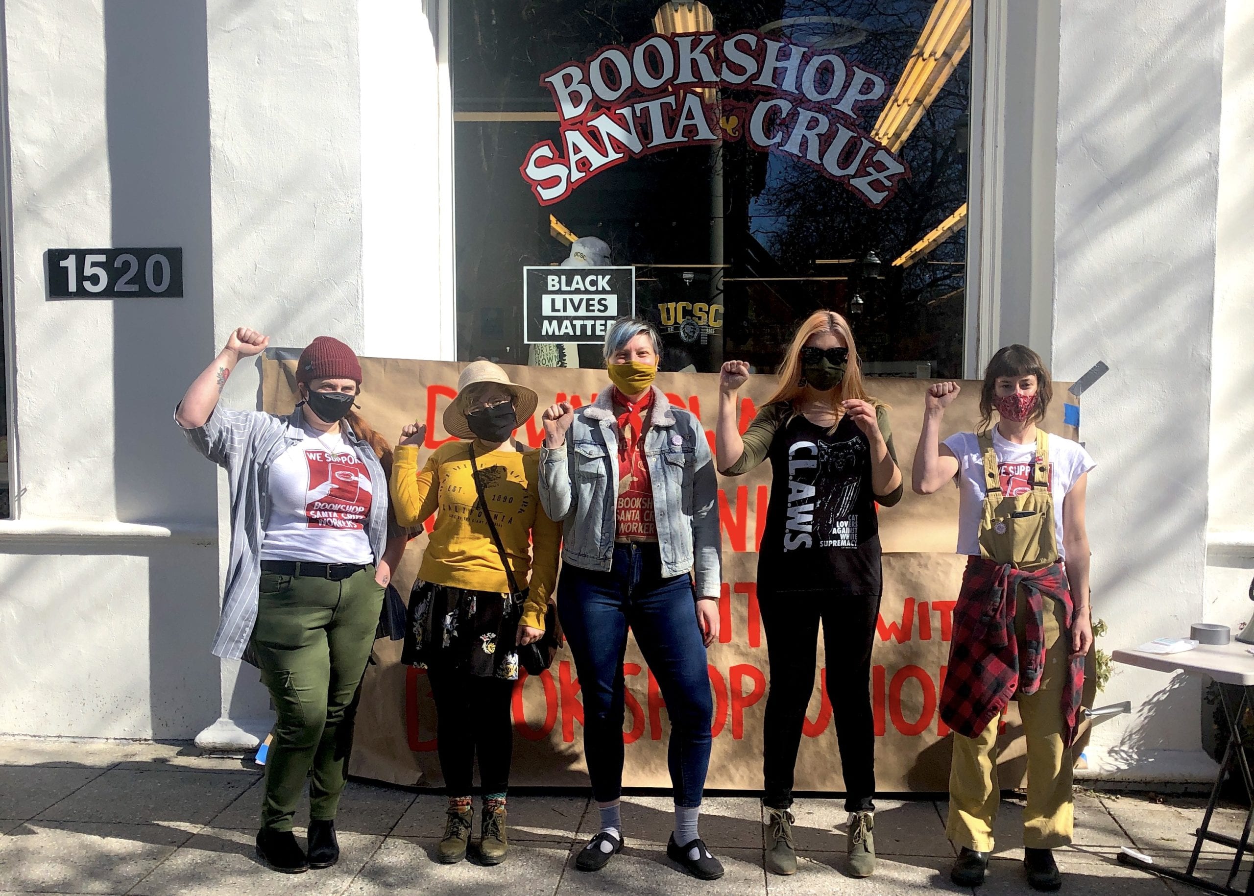 Bookshop Santa Cruz workers pose in front of store